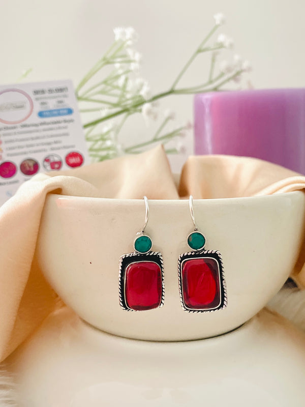 Maroon Red Tab Stone with Emerald Dot